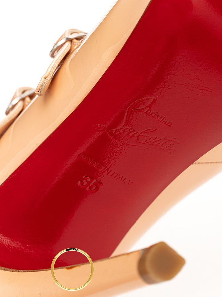 Rosa Lackpumps von Christian Louboutin mit Riemen