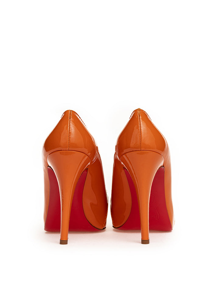 Christian Louboutin Orange Patent Pumps