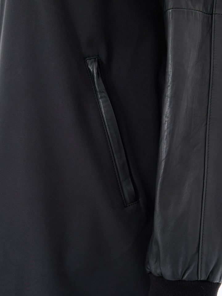 Parka Nero in Tessuto Tecnico e Pelle Moose Knuckles