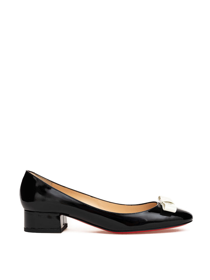 Low patent leather shoe with Christian Louboutin bow