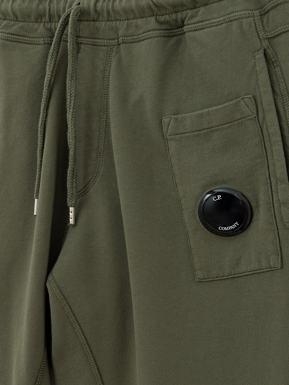 CP Company green jogging trousers