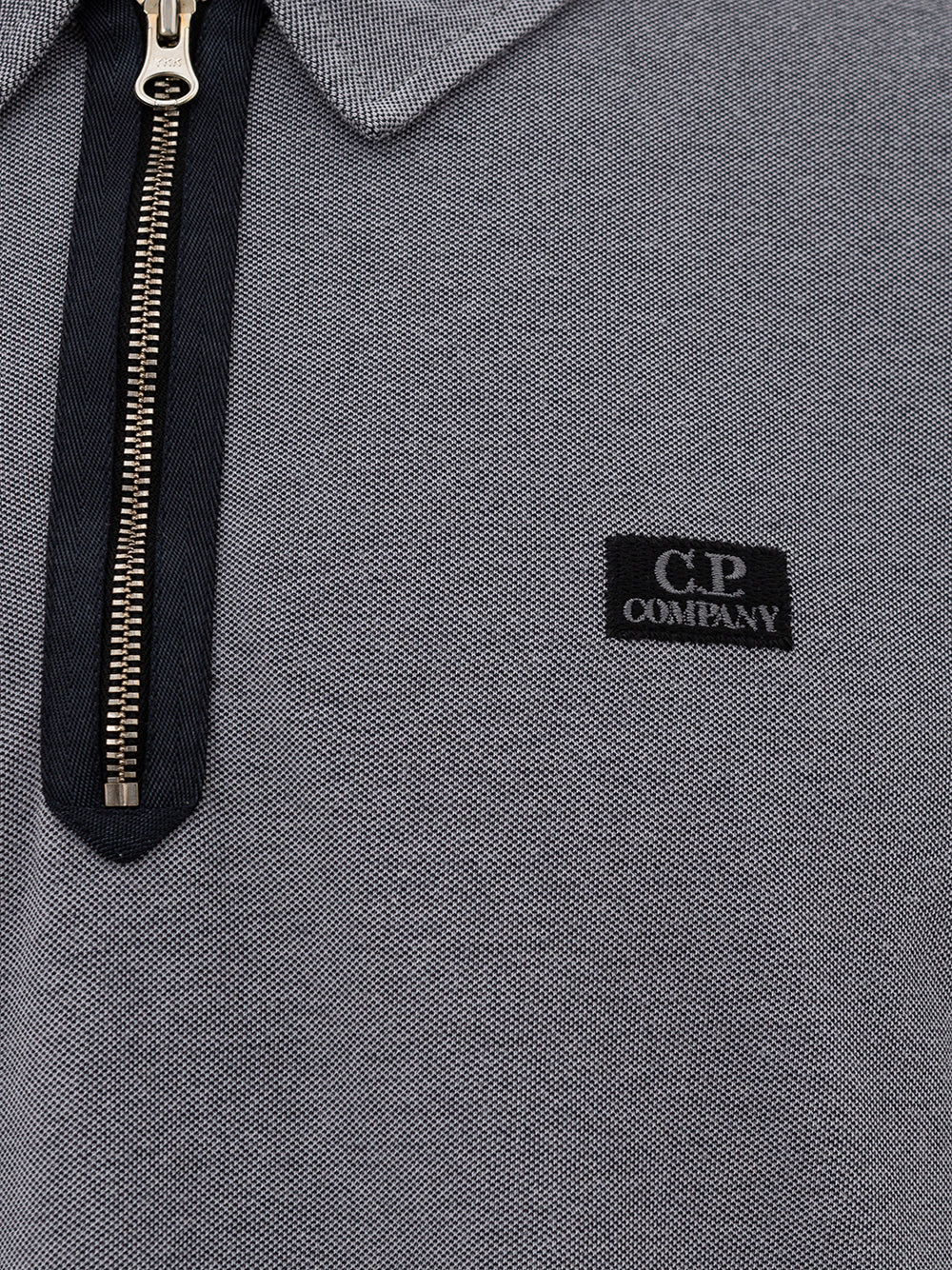 Polo with zip and CP Company logo
