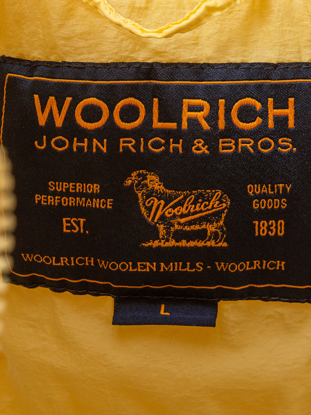 Chaqueta acolchada amarilla de Woolrich