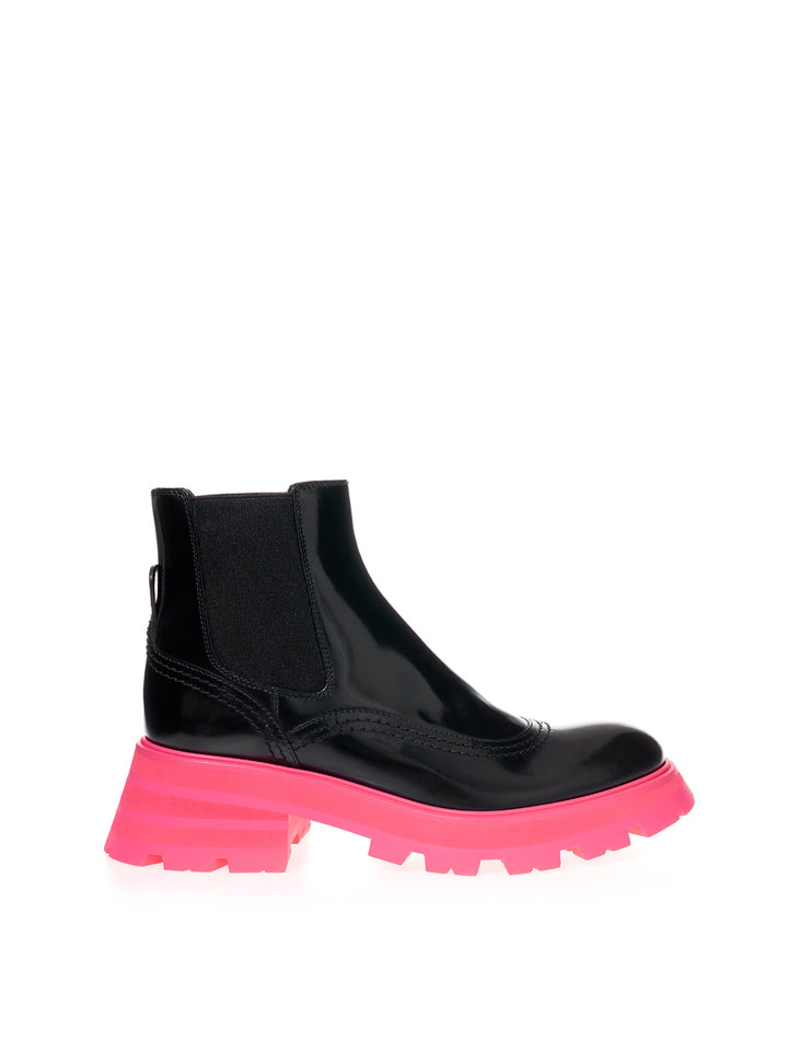 Alexander McQueen botines Chelsea con suela rosa fluo