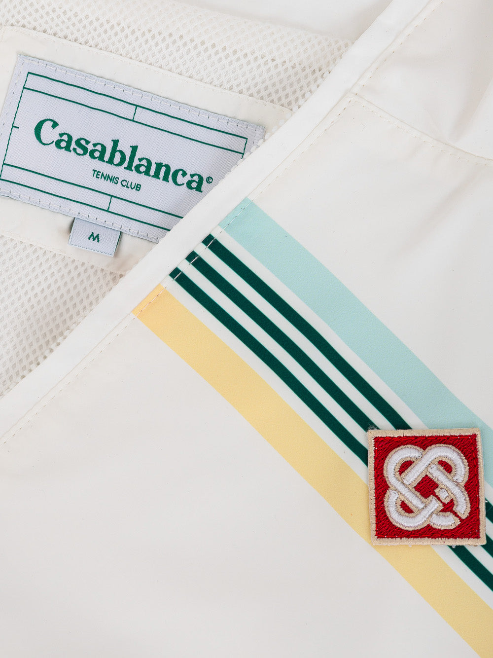 White jacket with Casablanca logo patch